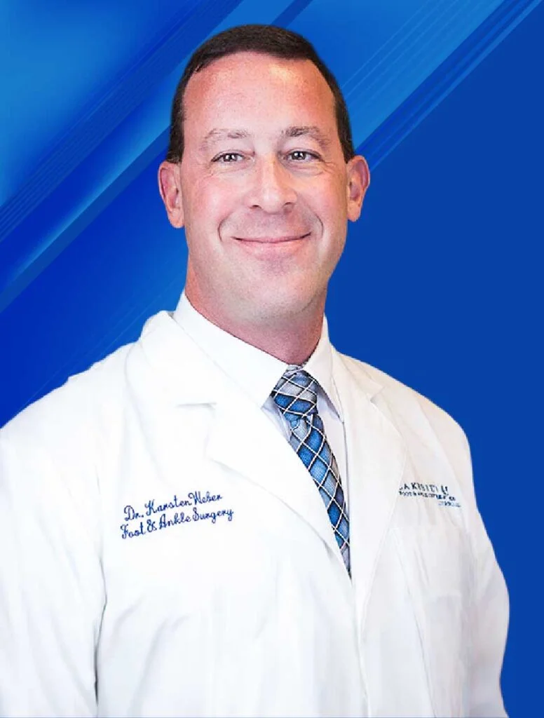 Portrait of Dr. Karsten Weber, podiatric surgeon in medical scrubs at Lakeside Foot & Ankle.
