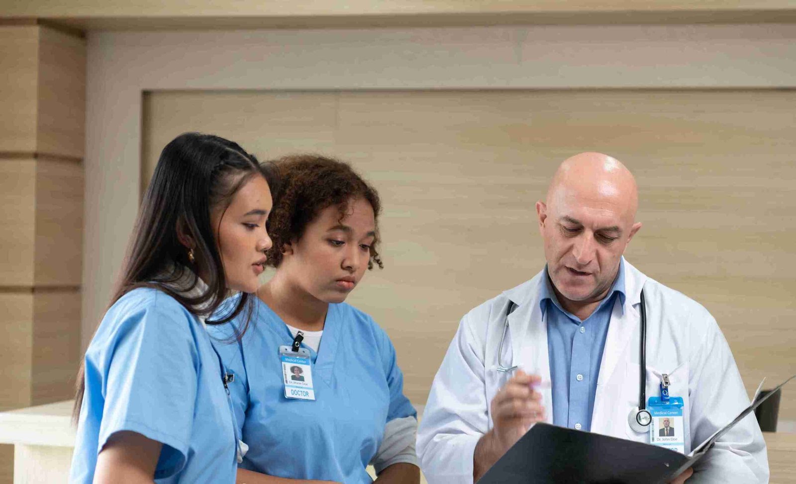 Lakeside Foot & Ankle medical staff collaborating on patient files in the clinic.