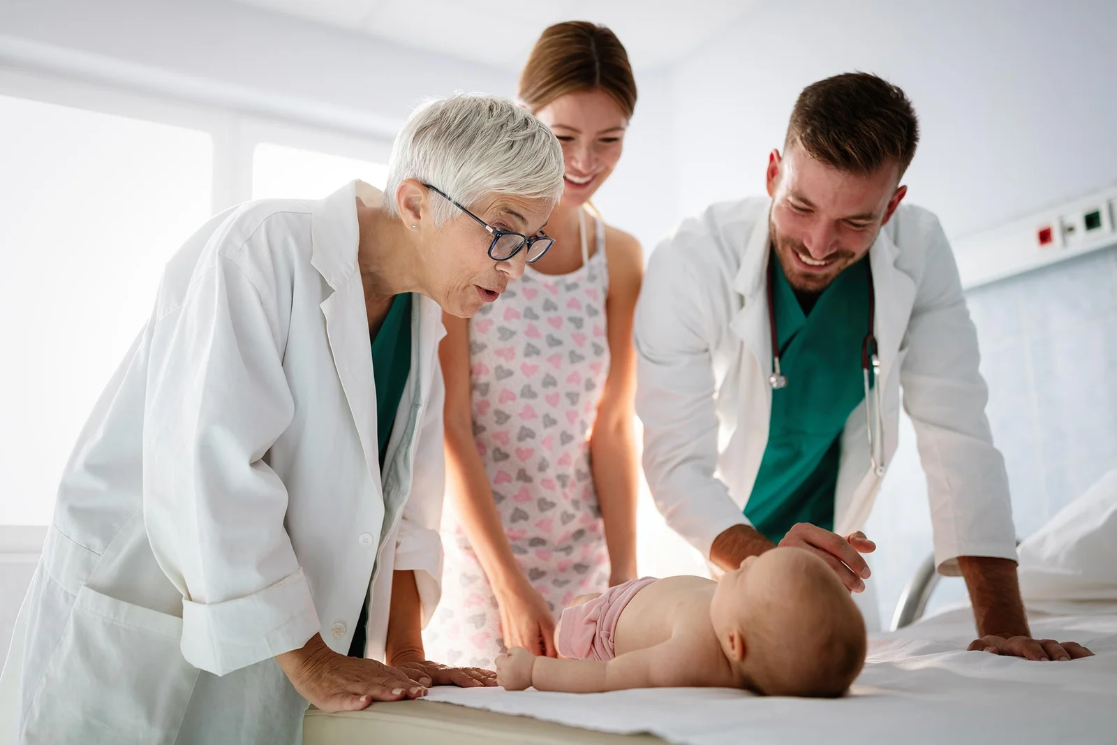Medical team at Lakeside Foot and Ankle examining an infant for pediatric podiatry concerns.