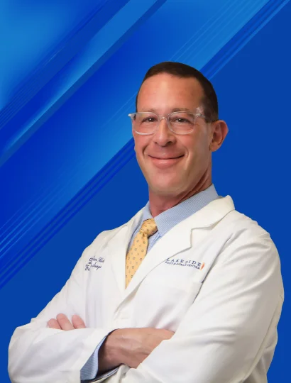 Portrait of Dr. Karsten Weber, podiatric surgeon in medical scrubs at Lakeside Foot & Ankle